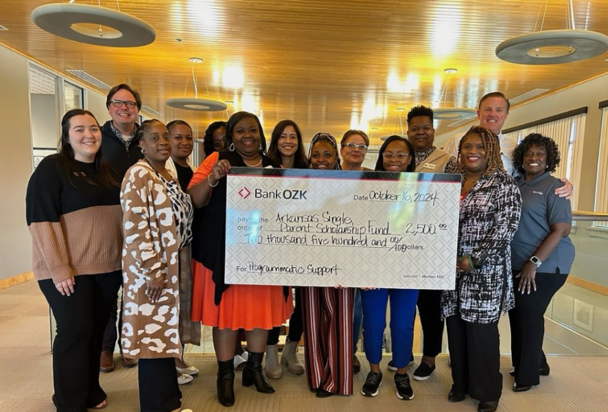 Bank OZK in Texarkana gave a check of $ 2500 to ASPF